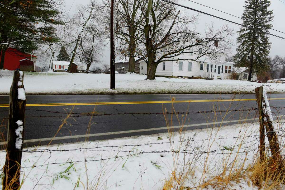 Kenwood Avenue runs in front of the farm of Peter and Linda Kleinke, seen here on Tuesday, Dec. 12, 2017, in Glenmont, N.Y. After Peter Kleinke passed away a few years ago, Linda has sold the farm land to a developer who has proposed building 31 houses and 32 townhouses on it. (Paul Buckowski / Times Union)