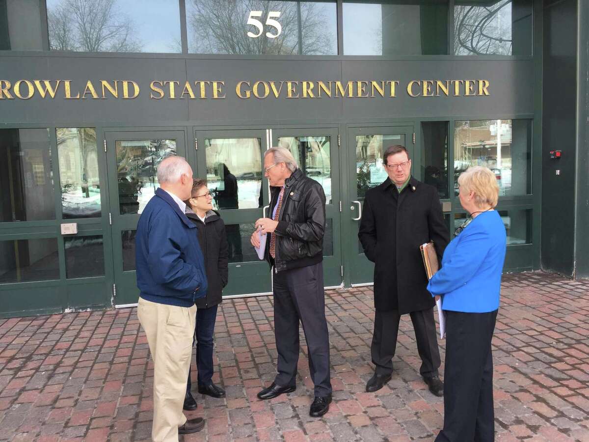 Henry Centrella, the former Winsted Finance Director imprisoned after embezzling more than $2 million from the town, had his application for parole denied in 2018. Above, Winsted officials and residents, including former mayor and now-Selectwoman Candy Perez and former Town Manager Robert Geiger, confer after the 2018 hearing.