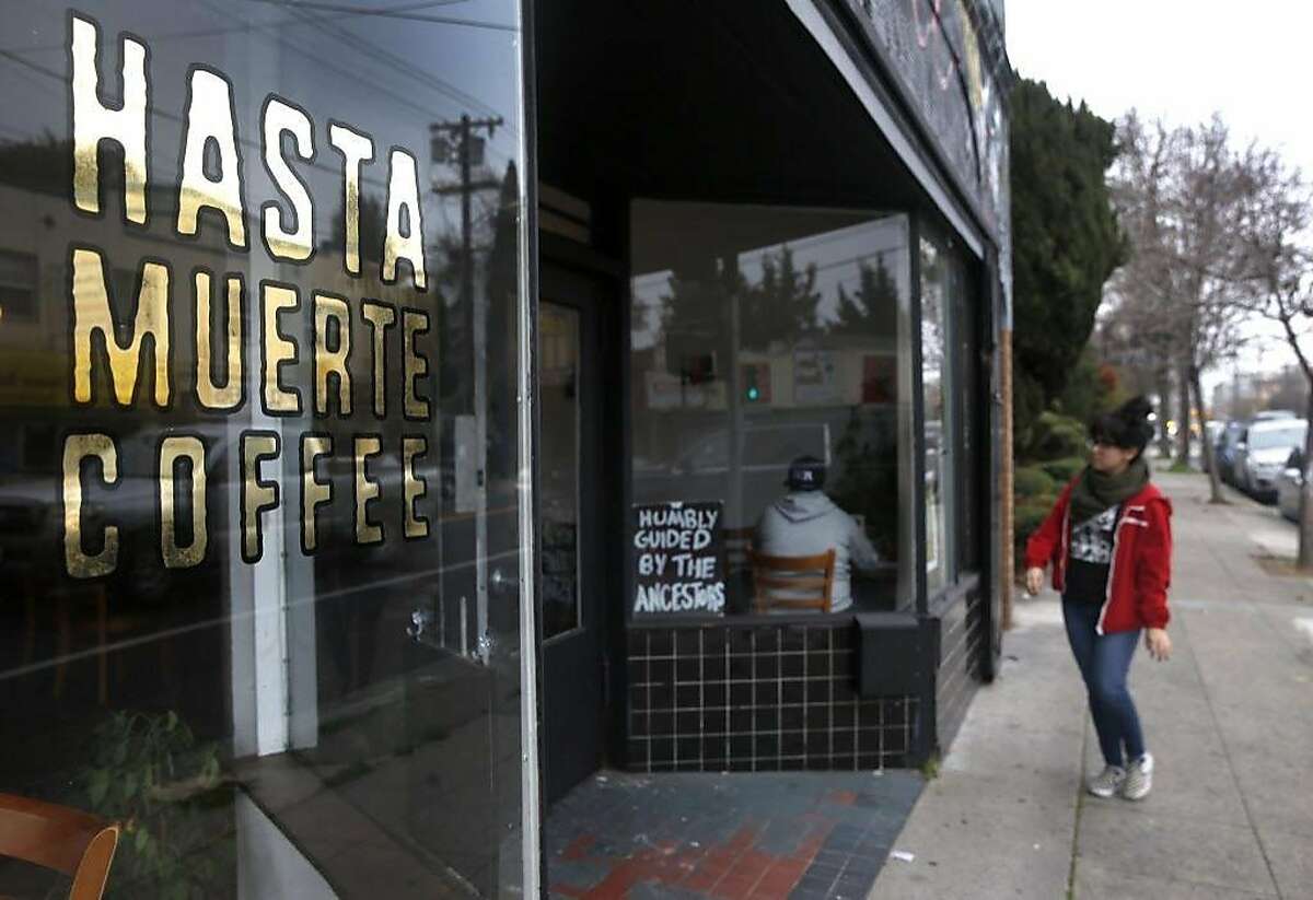 A customer arrives at Hasta Muerte Coffee in Oakland, Calif. on Friday, March 9, 2018. Owners of the cafe on Fruitvale Avenue are refusing service to uniformed police officers.