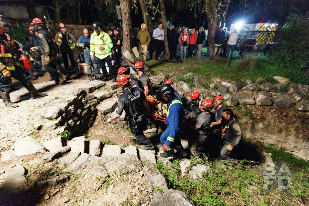 Photos provided by the San Antonio Fire Department show efforts by firefighters to rescue a teenage girl from Robber Baron Cave Thursday, March 8, 2018.