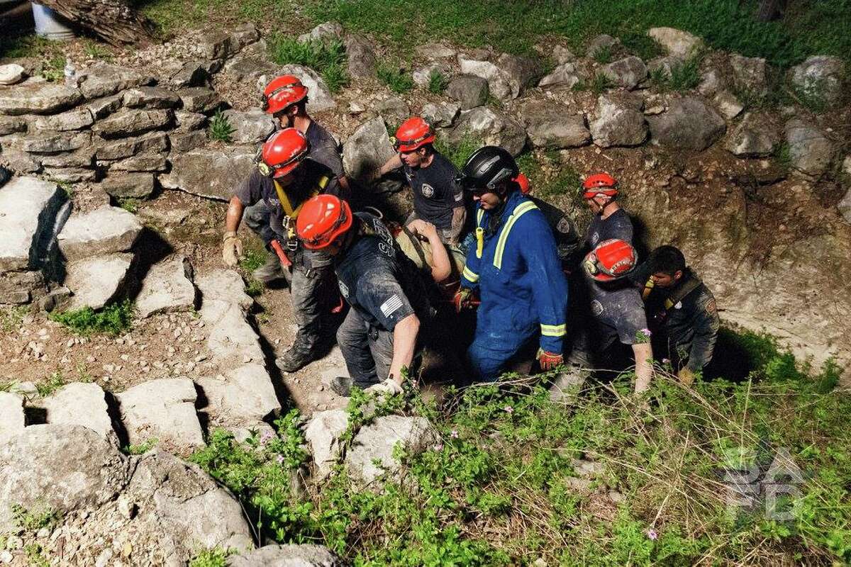 Photos provided by the San Antonio Fire Department show efforts by firefighters to rescue a teenage girl from Robber Baron Cave Thursday, March 8, 2018.