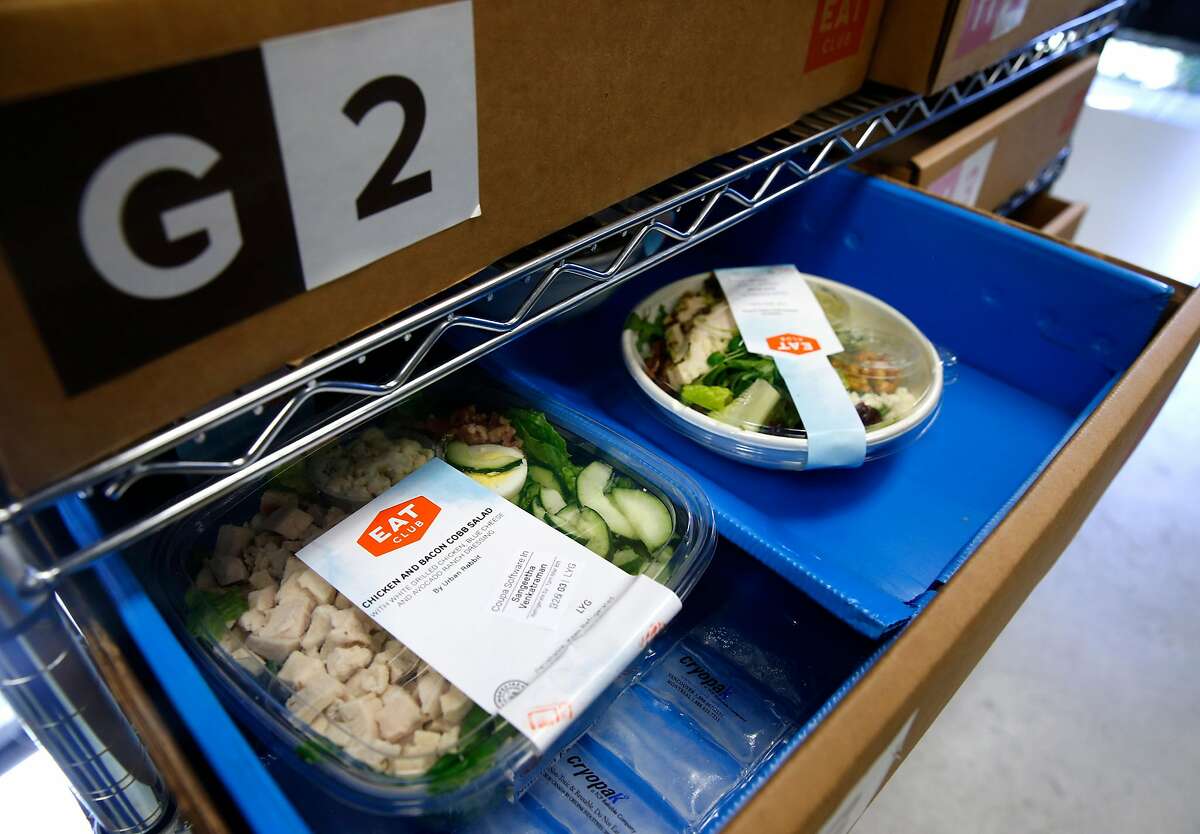 Meals ordered online by employees at Coupa Software and delivered by EAT Club are organized in numbered trays in San Mateo, Calif. on Thursday, March 8, 2018.