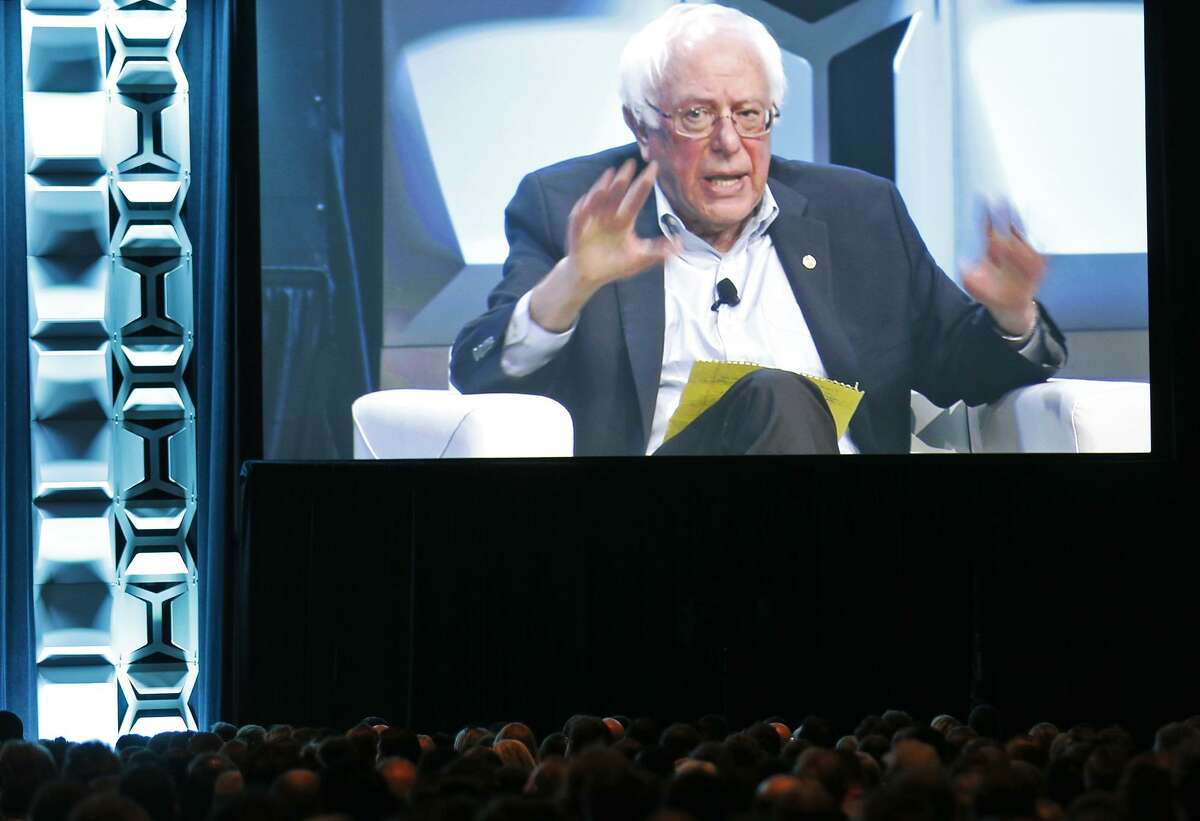 Vermont Sen. and former Democratic presidential candidate Bernie Sanders is pictured on a video screen during a conversation with CNN's Jake Tapper at SXSW Friday March 9, 2018 in Austin, Tx.