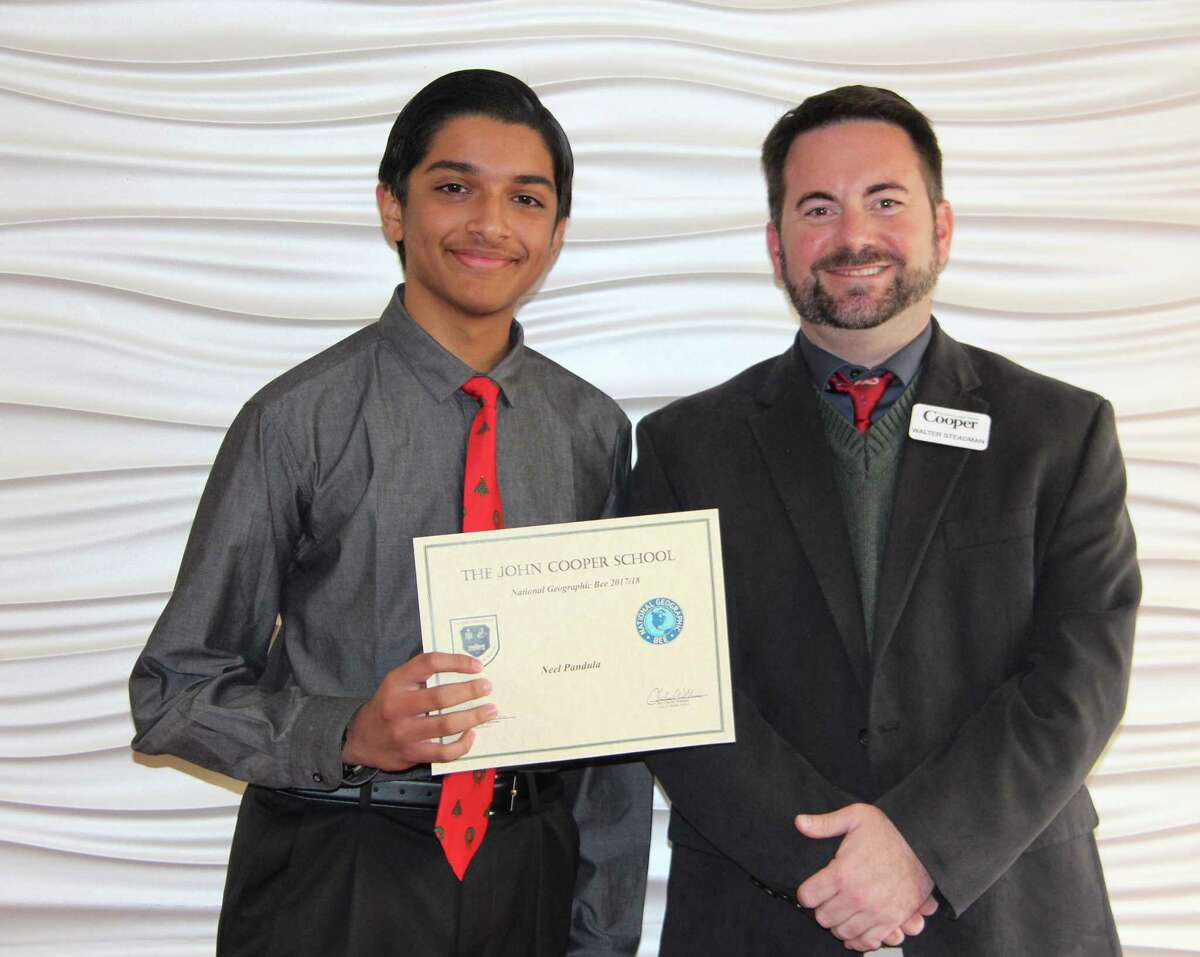 Neel Pandula, a seventh grade student at The John Cooper School, has qualified to compete in the state level competition of the National Geographic Bee. He is pictured with Middle School social science teacher Walt Steadman.