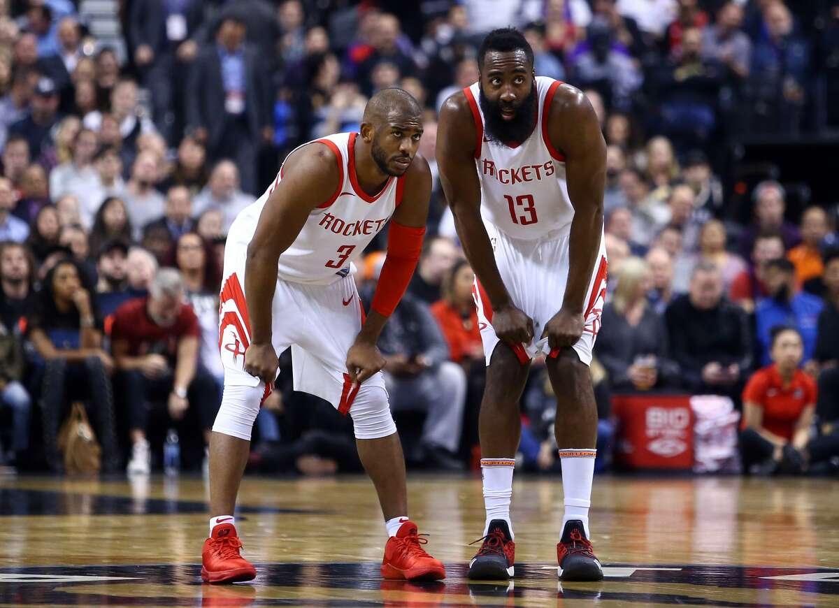 TORONTO, ON - MARCH 9: James Harden #13 of the Houston Rockets speaks with teammate Chris Paul #3 during the first half of an NBA game against the Tronto Raptors at Air Canada Centre on March 9, 2018 in Toronto, Canada. (Photo by Vaughn Ridley/Getty Images)