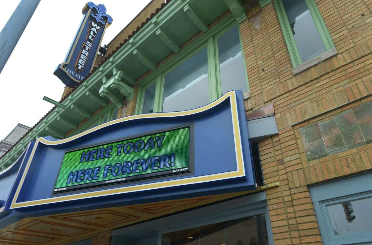 The Wall Street Theater Co. displays a sign on their marquis, "Here Today Here Forver!", Friday, March 9, 2018, in Norwalk, Conn. The Wall Street Theater Co. was touted to be the new centerpiece of the area but now is restructuring under Chapter 11 bankruptcy protection.