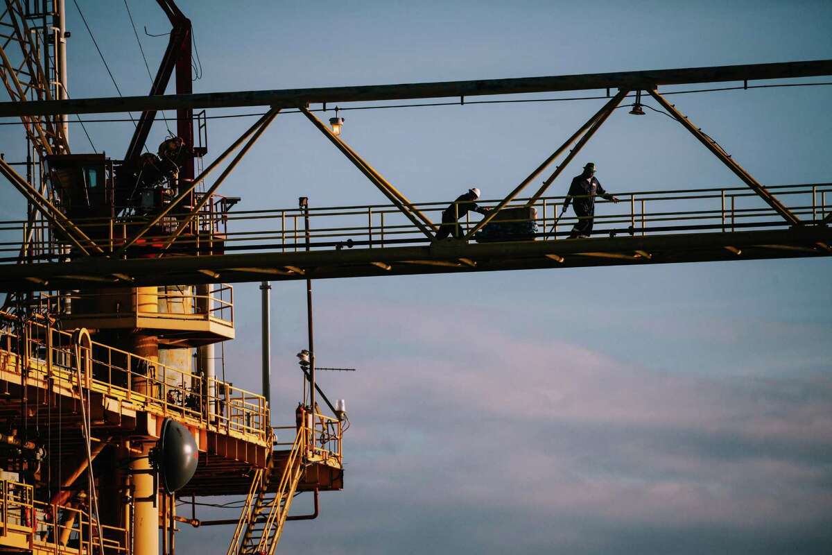 Workers aboard an oil and gas platform run by Energy XXI in the Gulf of Mexico, south of Port Fourchon, La. Energy XXI, which has been cited for workplace safety violations at a rate much higher than the industry average, is among the companies benefitting from the Trump administrations efforts to upend financial, environmental and safety regulations.