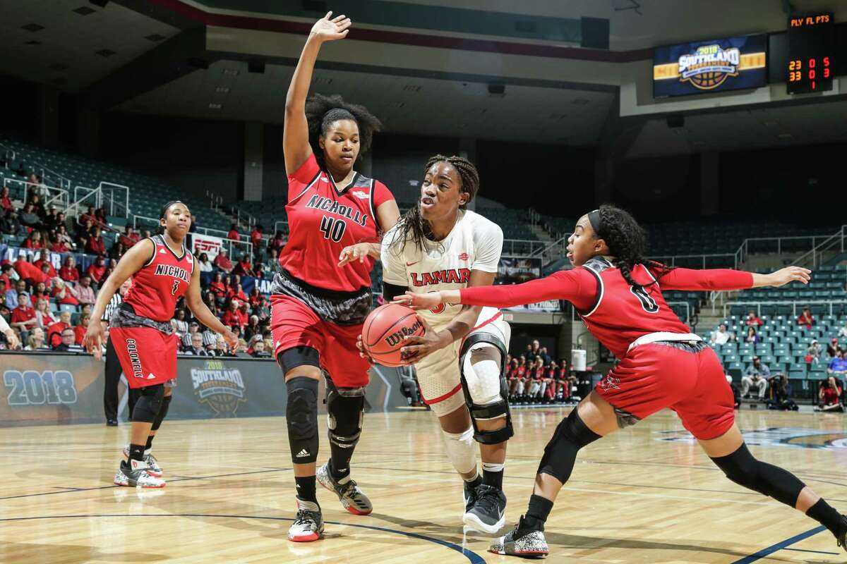 Lamar's Kiandra Bowers fights through the lane during a 74-68 loss to Nicholls in the Southland tournament semifinals at the Merrell Center in Katy on Saturday, March 10, 2018.