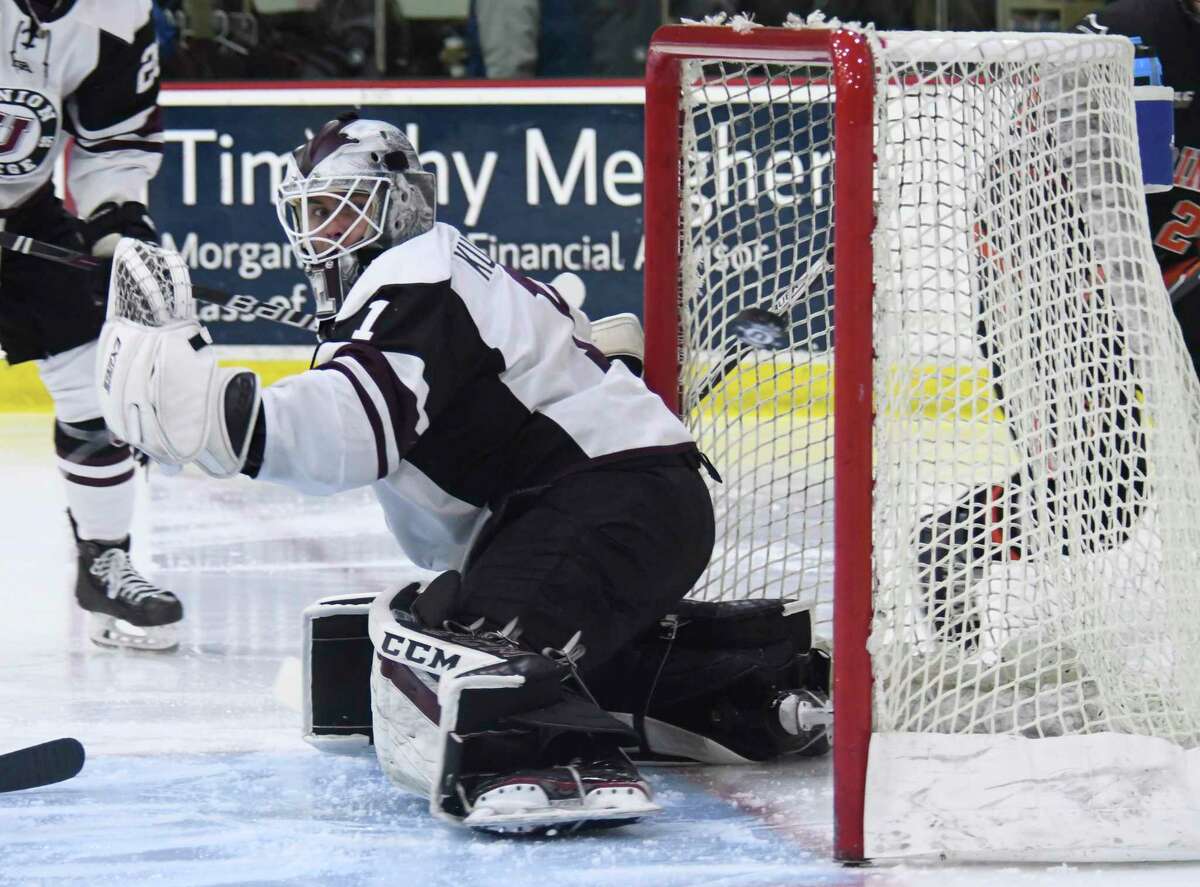 The puck flies wide of Union goaltender Jake Kupsky during an ECAC playoff game against Princeton in Schenectady, N.Y., at Union College on Saturday, Mar. 10, 2018. (Jenn March, Special to the Times Union)
