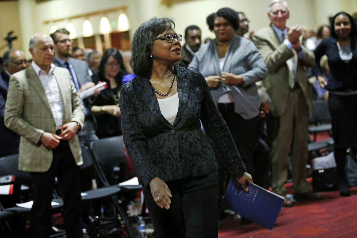 Anita Hill heads to the stage to speak at the Oakland Marriott at an event hosted by Rep. Barbara Lee, D-Oakland, and former Oakland Mayor Elihu Harris.