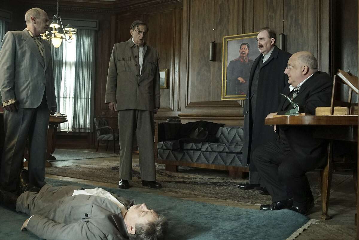 This image released by IFC Films shows, from left, Steve Buscemi, Adrian McLoughlin, Jeffrey Tambor, Dermot Crowley and Simon Russell Beale in a scene from "The Death of Stalin." (Nicola Dove/IFC Films via AP)