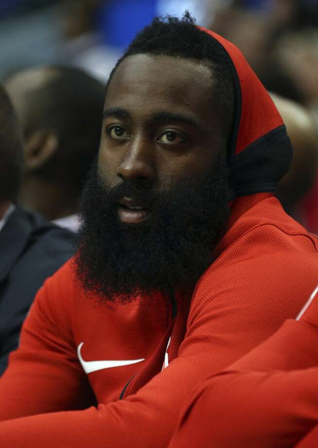 Houston Rockets guard James Harden (13) sits on the bench during an NBA basketball game against the Dallas Mavericks Sunday, March 11, 2018 in Dallas. (AP Photo/ Richard W. Rodriguez) Photo: Richard W. Rodriguez/Associated Press
