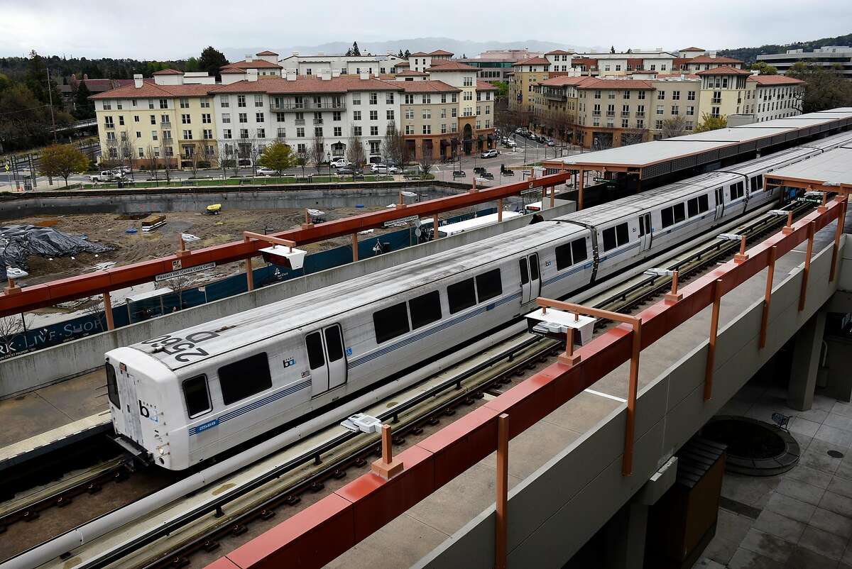 A train leaves the platform at the Pleasant Hill BART Station as the Avalon Walnut Creek Apartments, part of the Contra Costa Centre, are seen in the background, in Walnut Creek, CA, on Friday March 2, 2018.