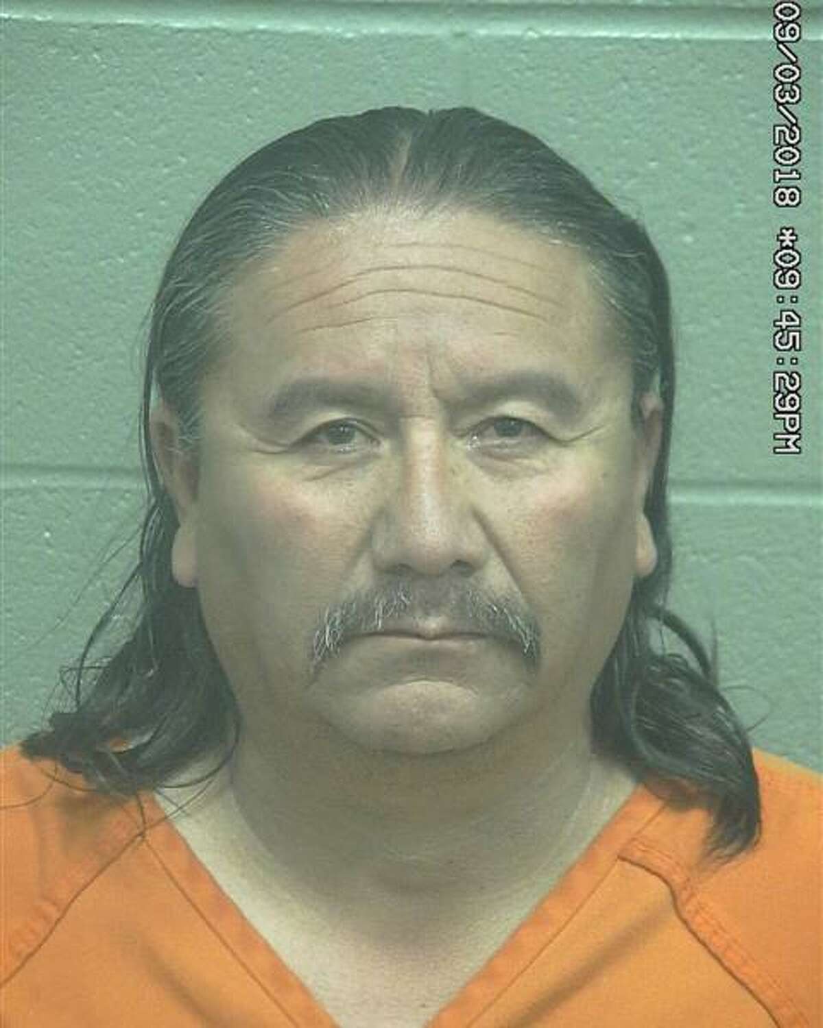 Sixto Medrano Jr., 52, was arrested March 8 after he allegedly recklessly caused injury to a woman, according to court documents.