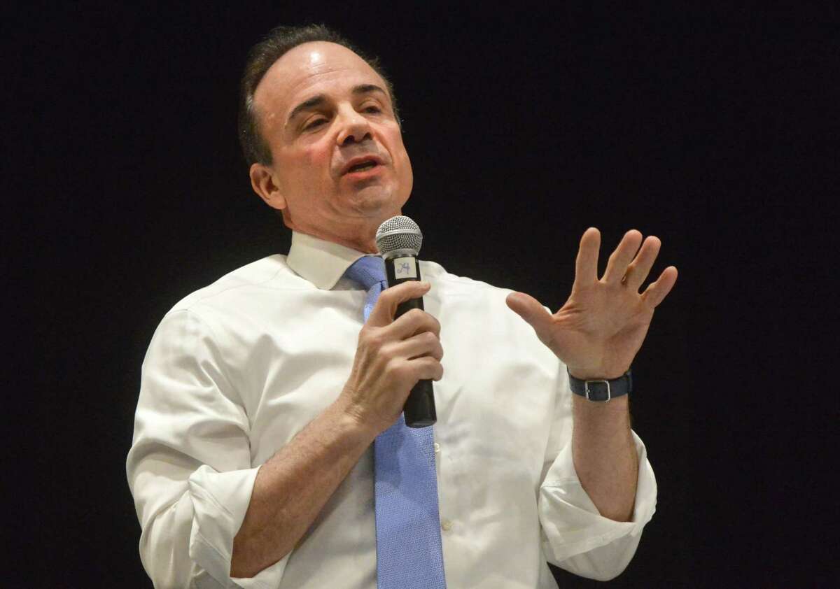 Bridgeport Mayor Joe Ganim answers a question about transportation during a gubernatorial forum for seven Democratic candidates for Governor at Fairfield Woods Middle School on Sunday March 11, 2018 in Fairfield Conn.
