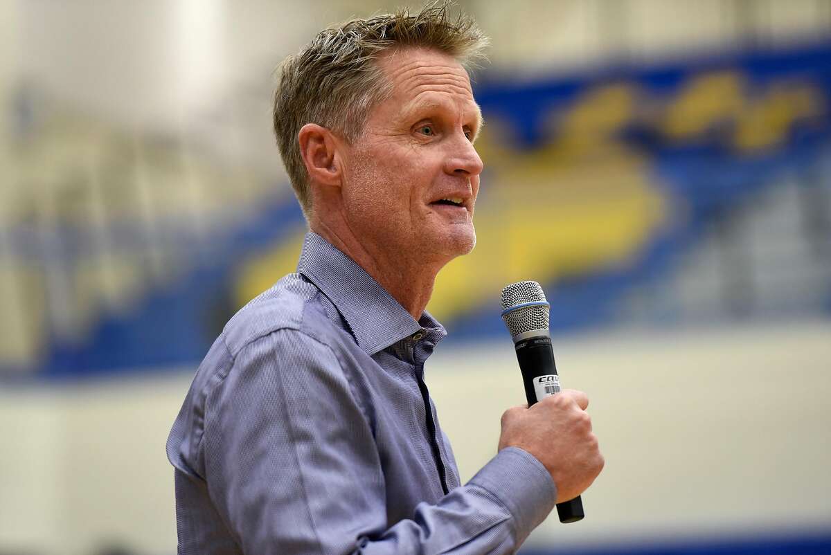 Golden State Warriors head coach Steve Kerr speaks with students at Newark Memorial High School during a panel discussion on gun violence, in Newark, Calif., on Monday March 12, 2018.