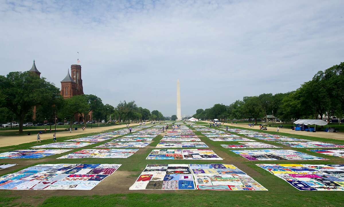 TOPSHOTS The AIDS Quilt is laid out on the National Mall July 23, 2012 as part of the 19th International AIDS Conference in Washington, DC. The conference is expected to draw 25,000 people, including politicians, scientists and activists, as well as some of the estimated 34 million people living with HIV who will tell their stories. AFP PHOTO/Karen BLEIERKAREN BLEIER/AFP/GettyImages