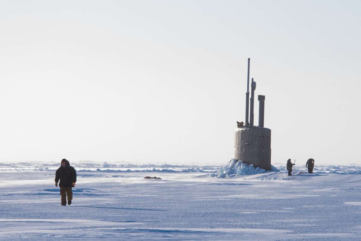 Seawolf class submarine USS Connecticut SSN 22 breaks through the ice March 9, 2018 in support of Ice Exercise (ICEX) 2018. ICEX 2018 is a five-week exercise that allows the Navy to assess its operational readiness in the Arctic, increase experience in the region, advance understanding of the Arctic environment, and continue to develop relationships with other services, allies and partner organizations.