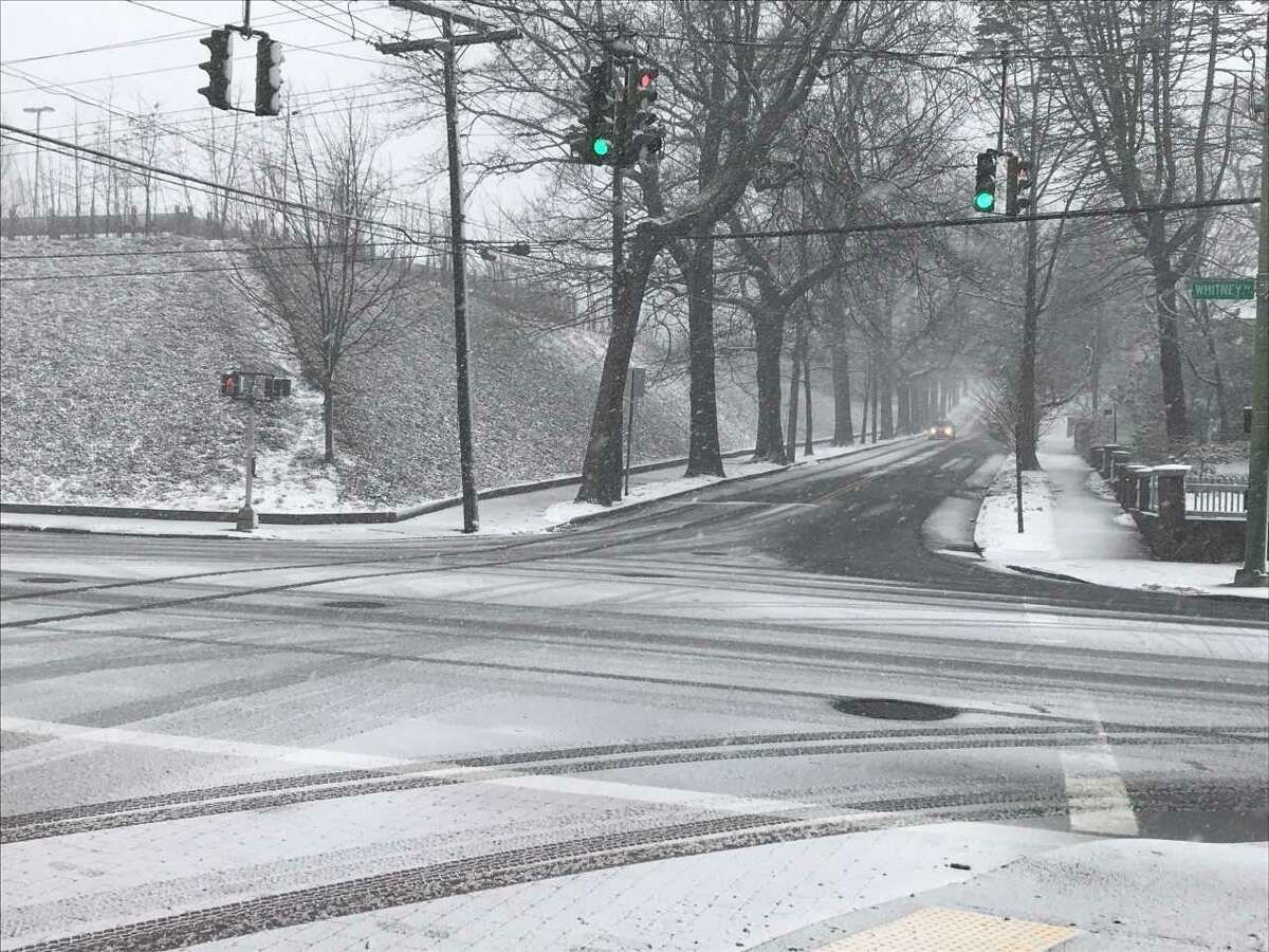 The intersection of Whitney Avenue and Edwards Street at 10:15 a.m. during Tuesday's snowstorm.
