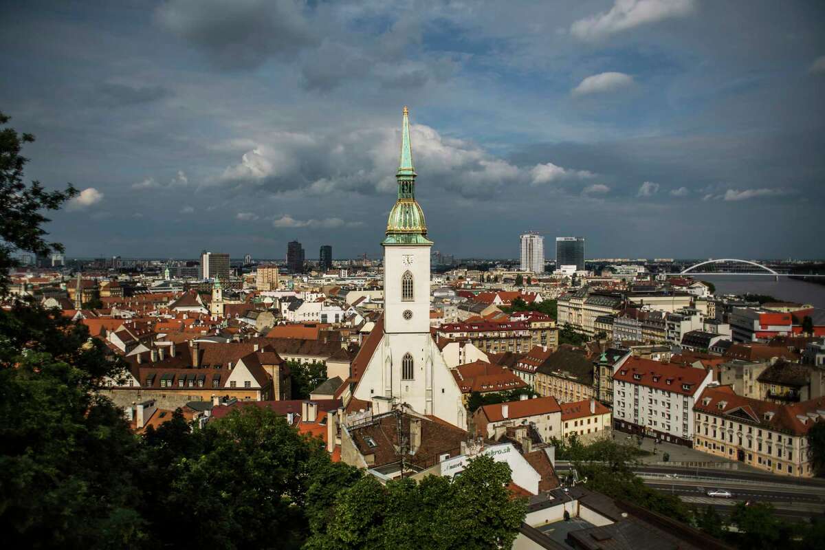 St. Martin's Cathedral stands above commercial and residential property on the city skyline in Bratislava, Slovakia, on May 27, 2015.