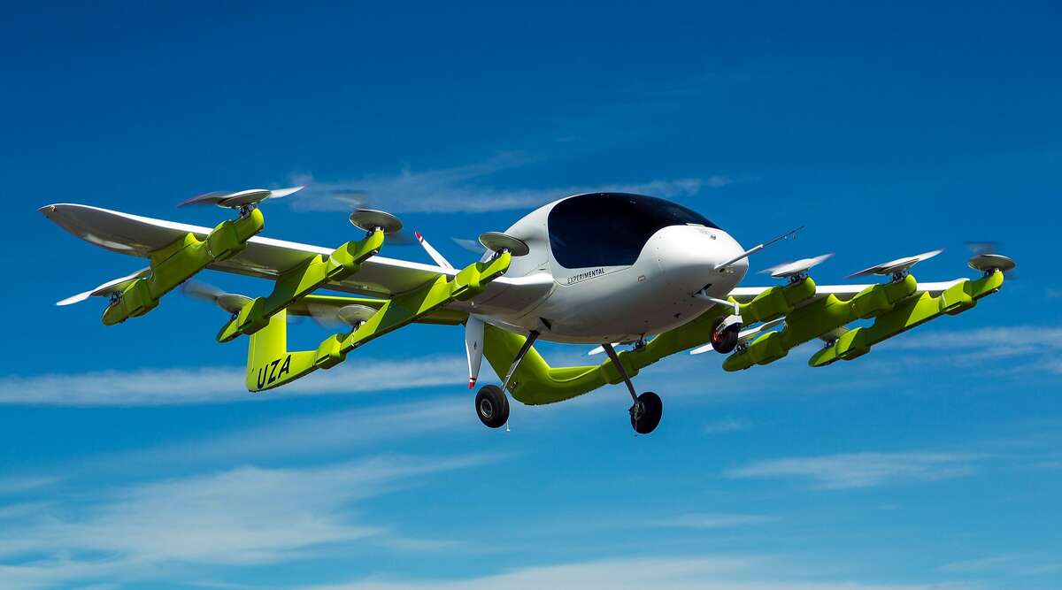 In this handout picture received on March 13, 2018 from New Zealand based aviation company Zephyr Airworks shows a "Cora" electric powered air taxi in flight. Self-piloted flying taxis are being tested in New Zealand as part of a project backed by Google co-founder Larry Page that supporters say will revolutionise personal transport. New Zealand regulators on March 13, 2018 approved plans for Zephyr Airworks, a subsidiary of Page's company Kitty Hawk, to develop and test the futuristic air taxis. KEEP CLICKING OR SWIPING TO SEE THE COST OF BAY AREA COMMUTES ===>   CREDIT Zephyr Airworks / RICHARD LORD/AFP/Getty Images