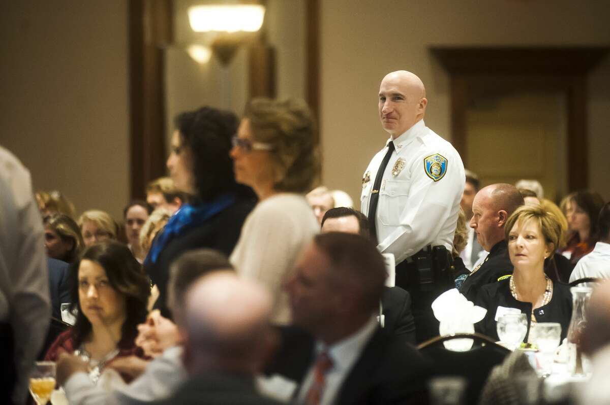 Midland Chief of Police Clifford Block is recognized during the Midland Area Chamber of Commerce Quarter luncheon on Tuesday, March 13, 2018 at the Great Hall Banquet & Convention Center. (Katy Kildee/kkildee@mdn.net)