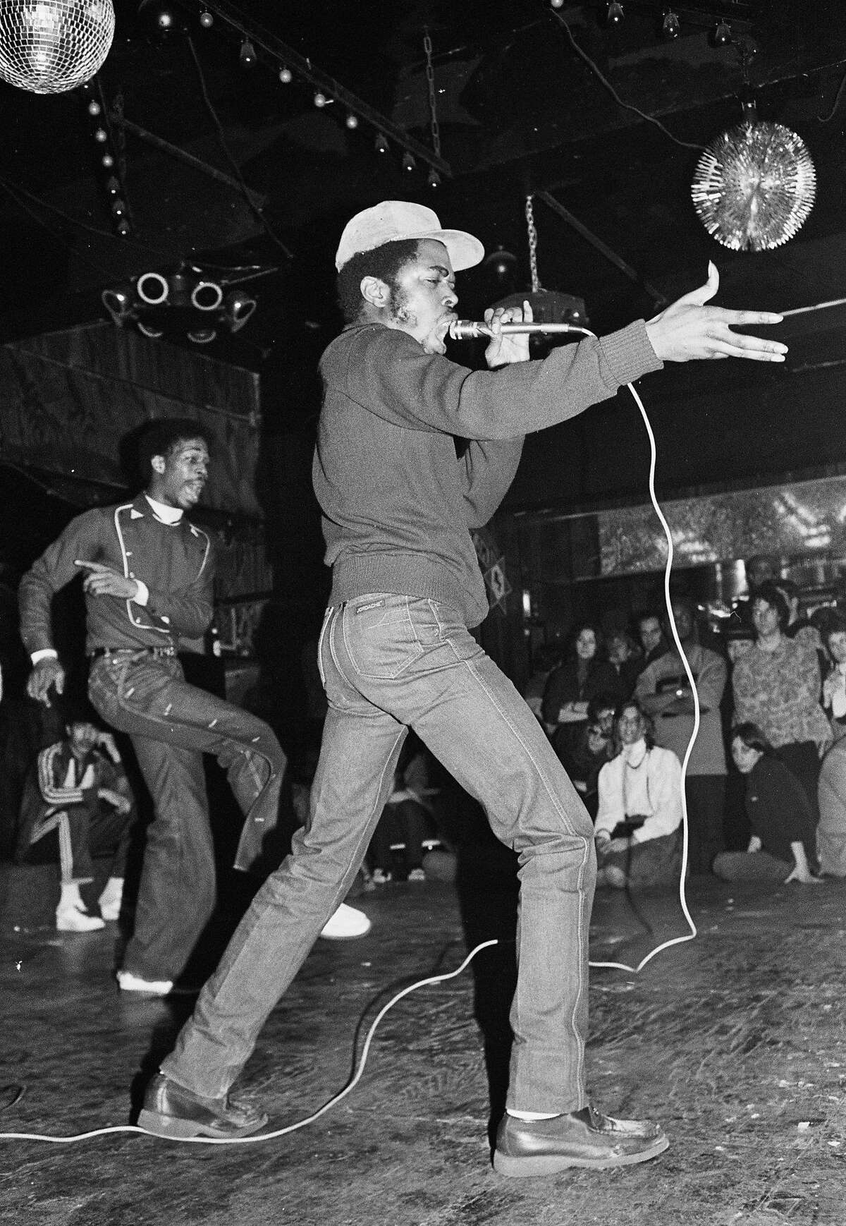 Oakland Museum of California presents "Respect: Hip-Hop Style & Wisdom," Joe Conzo, JDL (Jerry D. Lewis) of Cold Crush Brothers at Club Negril, 1981. Photo print. Courtesy of the Joe Conzo Archives.