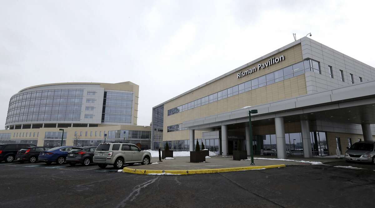 This photo shows the University Hospital Ahuja Medical Center Kathy Risman Pavilion, Monday, March 12, 2018, in Beachwood, Ohio. The University Hospital in Ohio and another fertility clinic in San Francisco experienced equipment failures on the same day that may have damaged hundreds of frozen eggs and embryos, something that a fertility expert called a stunning coincidence and that is already producing lawsuits from crestfallen couples. (AP Photo/Tony Dejak)