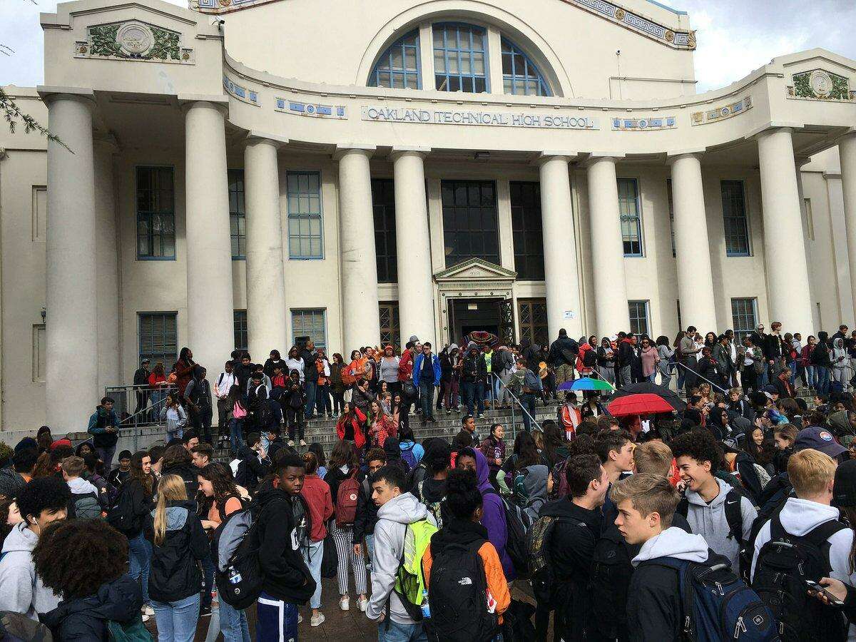 Students rally at Oakland Technical High School Wednesday as part of the national walkout to denounce gun violence.