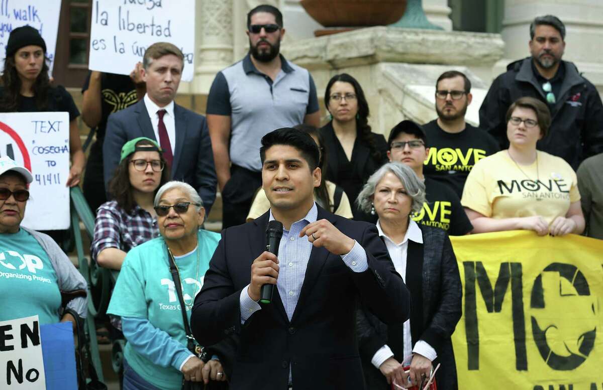 City Council member Rey Saldana speaks as members of Texas Organizing Project, Pro-Immigrant Coalition, Mi Familia Vota, RAICES, MALDEF, COSECHA, city council members and others, gather on the steps of City Hall to voice opposition to SB 4, on Wednesday, March 14, 2018.