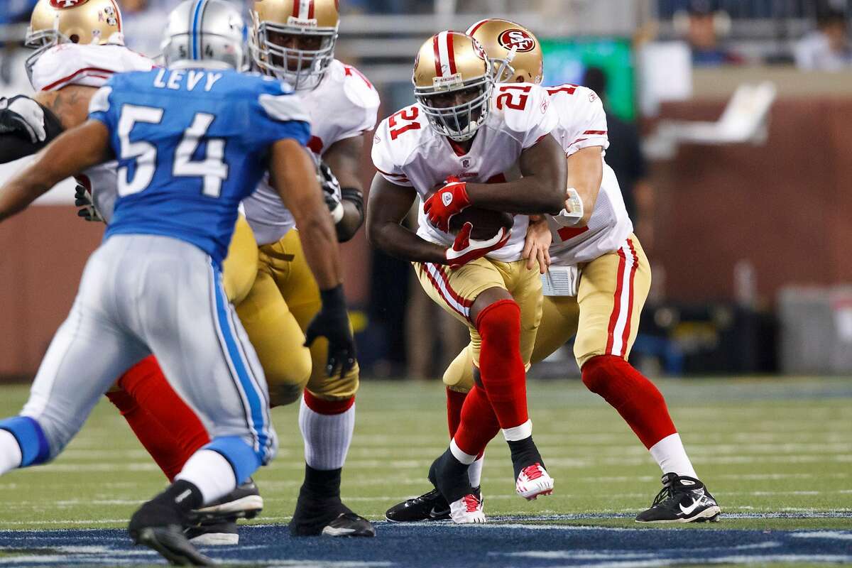 San Francisco 49ers running back Frank Gore (21) runs the ball in the second half of an NFL football game against the Detroit Lions in Detroit, Sunday, Oct. 16, 2011. (AP Photo/Rick Osentoski)