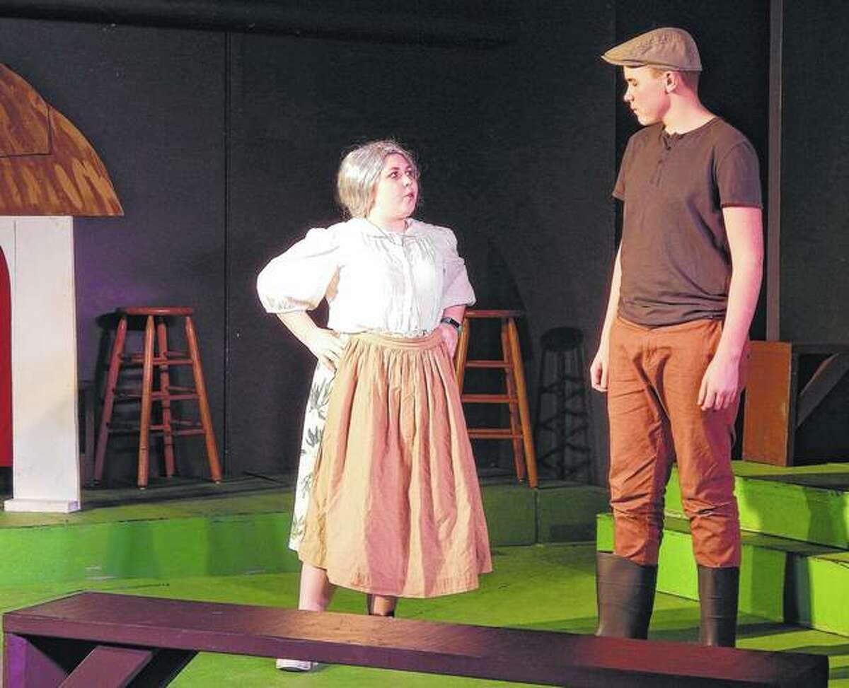 Mother Doyle, portrayed by Presley Frye (left), tells Gavin Cox’s Fin that he can’t marry her daughter until he has learned how to tell a story. The two were rehearsing Tuesday ahead of today’s opening of “Blather, Blarney and Balderdash” at Playhouse on the Square.