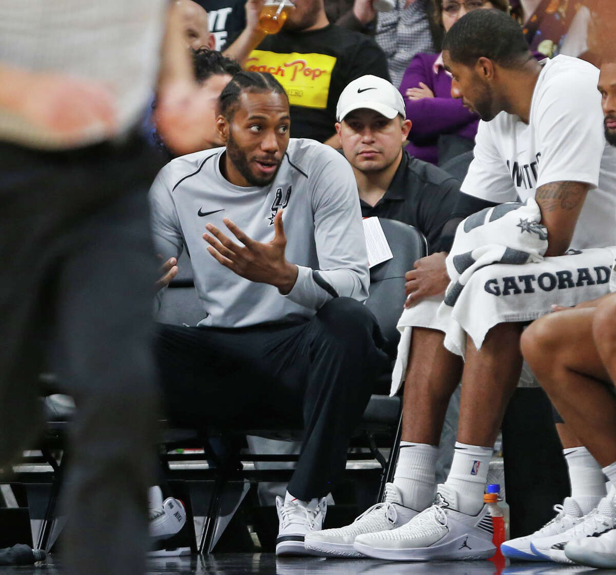 FILE PHOTO: Kawhi Leonard #2 of the San Antonio Spurs still not playing talks with teammate LaMarcus Aldridge #12 of the San Antonio Spurs during game against the Orlando Magic at AT&T Center on March 13, 2018 in San Antonio, Texas. NOTE TO USER: User expressly acknowledges and agrees that , by downloading and or using this photograph, User is consenting to the terms and conditions of the Getty Images License Agreement. (Photo by Ronald Cortes/Getty Images)