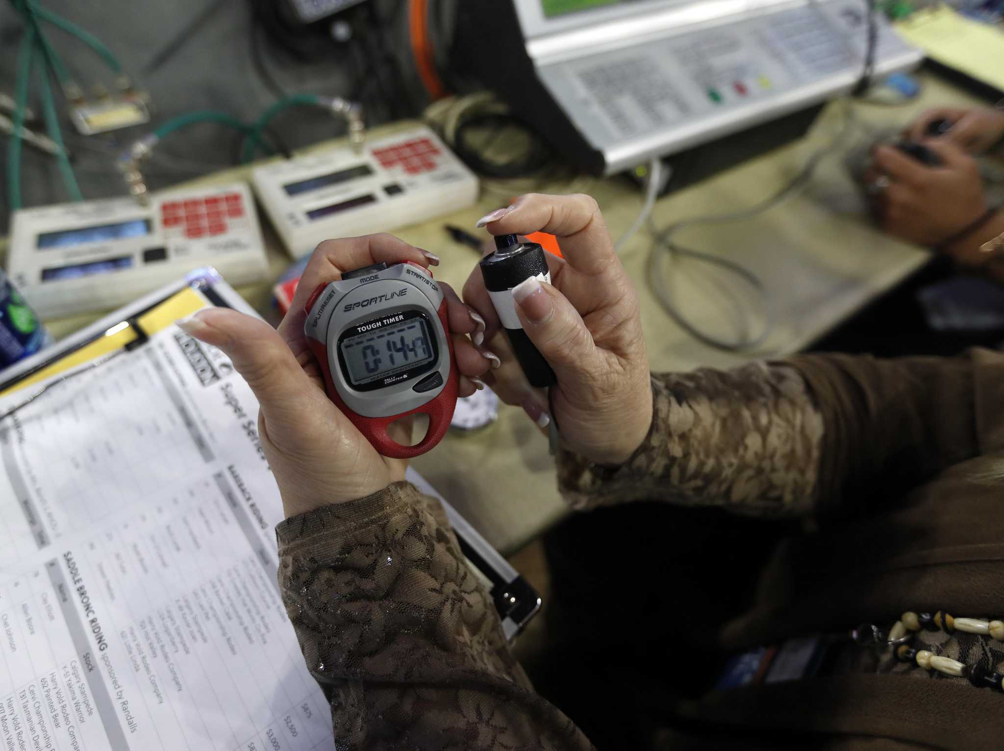 At the 50yard line, Rodeo Houston’s timers clock winners and losers