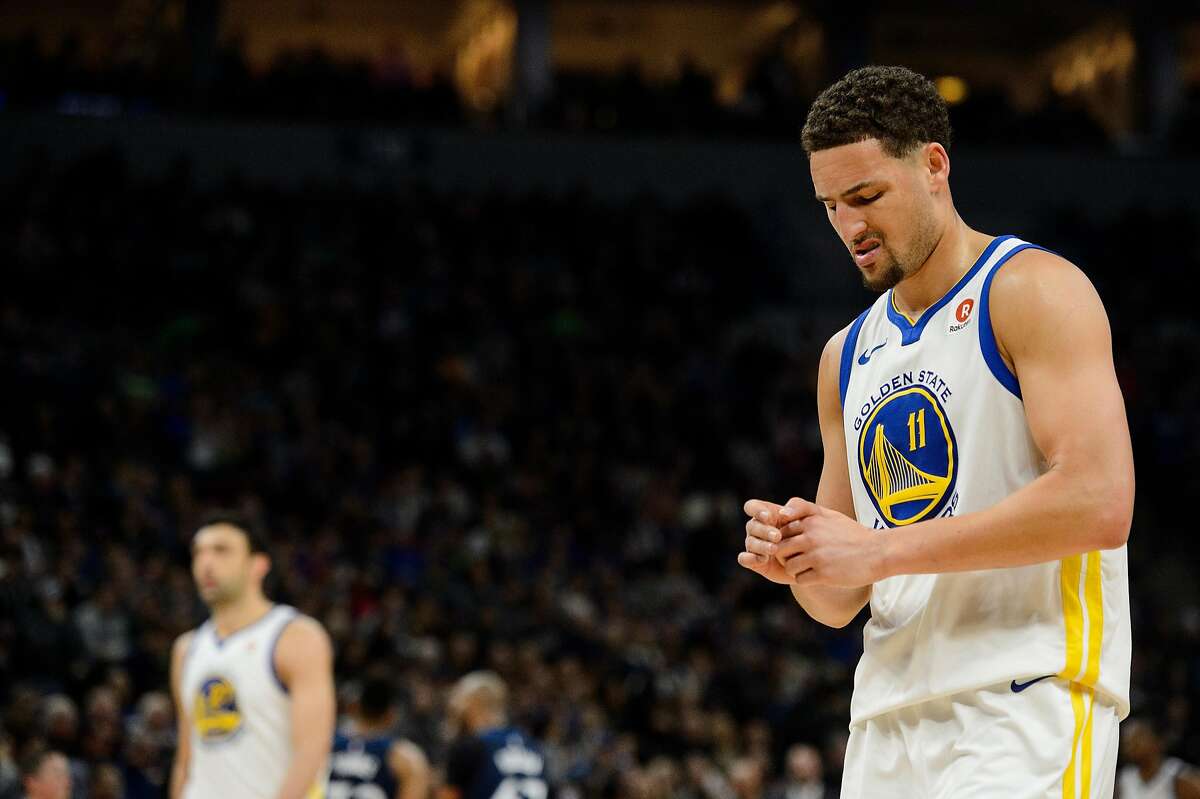 Klay Thompson #11 of the Golden State Warriors looks on during the game against the Minnesota Timberwolves on March 11, 2018 at the Target Center in Minneapolis, Minnesota. 
