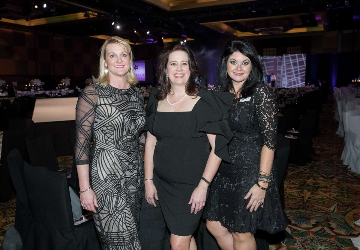 The 19th annual Trailblazer Awards Luncheon and Fashion Show Officer in Charge Wendy Vandeventer, from left, Chairman Jennifer Summerour and Vice Chairman Janeen Comer pose for a photo on Friday, Feb. 2, 2018, in Houston. ( Yi-Chin Lee / Houston Chronicle )