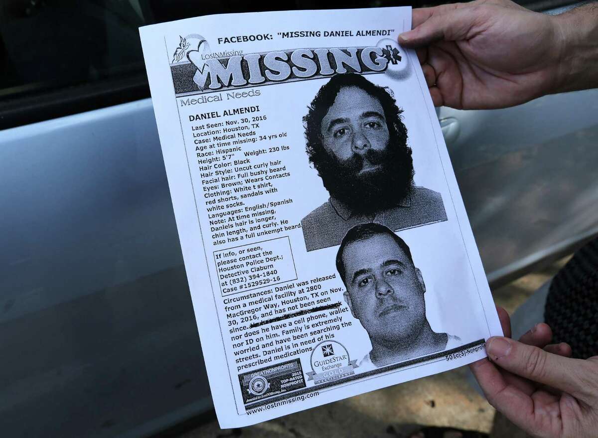George Ruano hands out fliers including pictures and information about his missing brother, Thursday, Jan. 12, 2017, in Houston. Ruano has been searching for his brother, Daniel Almendi, who suffers from schizophrenia, since Daniel was released from the Harris County Psychiatric Center on Nov. 30, 2016. ( Mark Mulligan / Houston Chronicle )