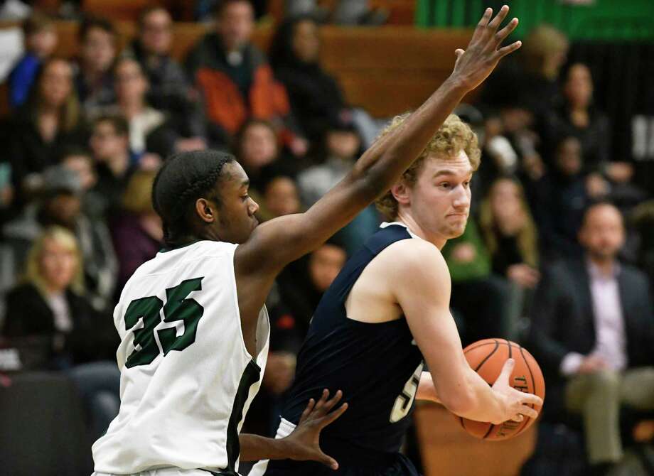 Mekeel Christian Academy's Carter Stewart (5) moves the ball past Green Tech's  Omari Koonce (35) during the first half of a high school basketball game on Saturday, Jan.13, 2018, in Albany, N.Y. (Hans Pennink / Special to the Times Union) Photo: Hans Pennink / 20042651A