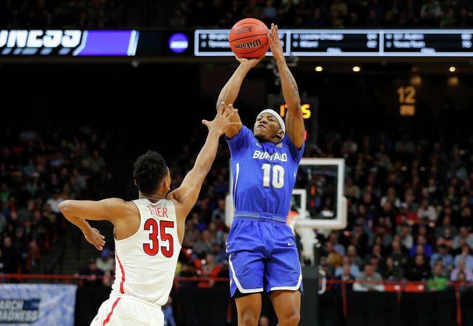 BOISE, ID - MARCH 15:  Wes Clark #10 of the Buffalo Bulls shoots the ball against Allonzo Trier #35 of the Arizona Wildcats in the first half during the first round of the 2018 NCAA Men's Basketball Tournament at Taco Bell Arena on March 15, 2018 in Boise, Idaho.  (Photo by Kevin C. Cox/Getty Images) Photo: Kevin C. Cox / 2018 Getty Images