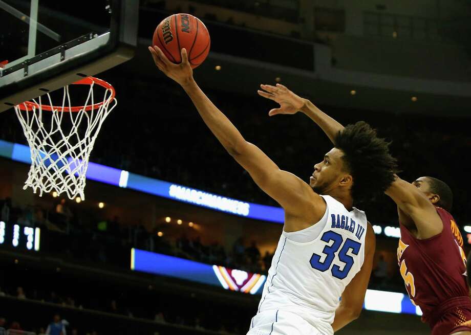 PITTSBURGH, PA - MARCH 15:  Marvin Bagley III #35 of the Duke Blue Devils gets a shot off against the Iona Gaels during the first half of the game in the first round of the 2018 NCAA Men's Basketball Tournament at PPG PAINTS Arena on March 15, 2018 in Pittsburgh, Pennsylvania.  (Photo by Justin K. Aller/Getty Images) Photo: Justin K. Aller / 2018 Getty Images