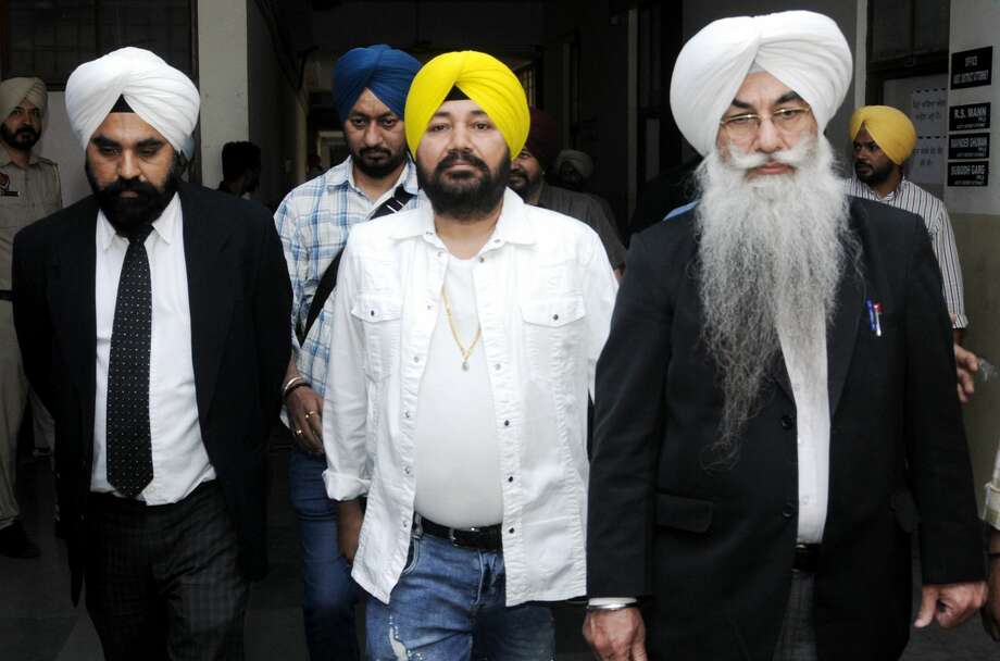Punjabi pop Singer Daler Mehndi was sentenced to two years of imprisonment, on Friday, in connection with a 2003 human trafficking case, and was later granted a bail at the District Court on March 16, 2018 in Patiala, India. Photo: Hindustan Times/Hindustan Times Via Getty Images