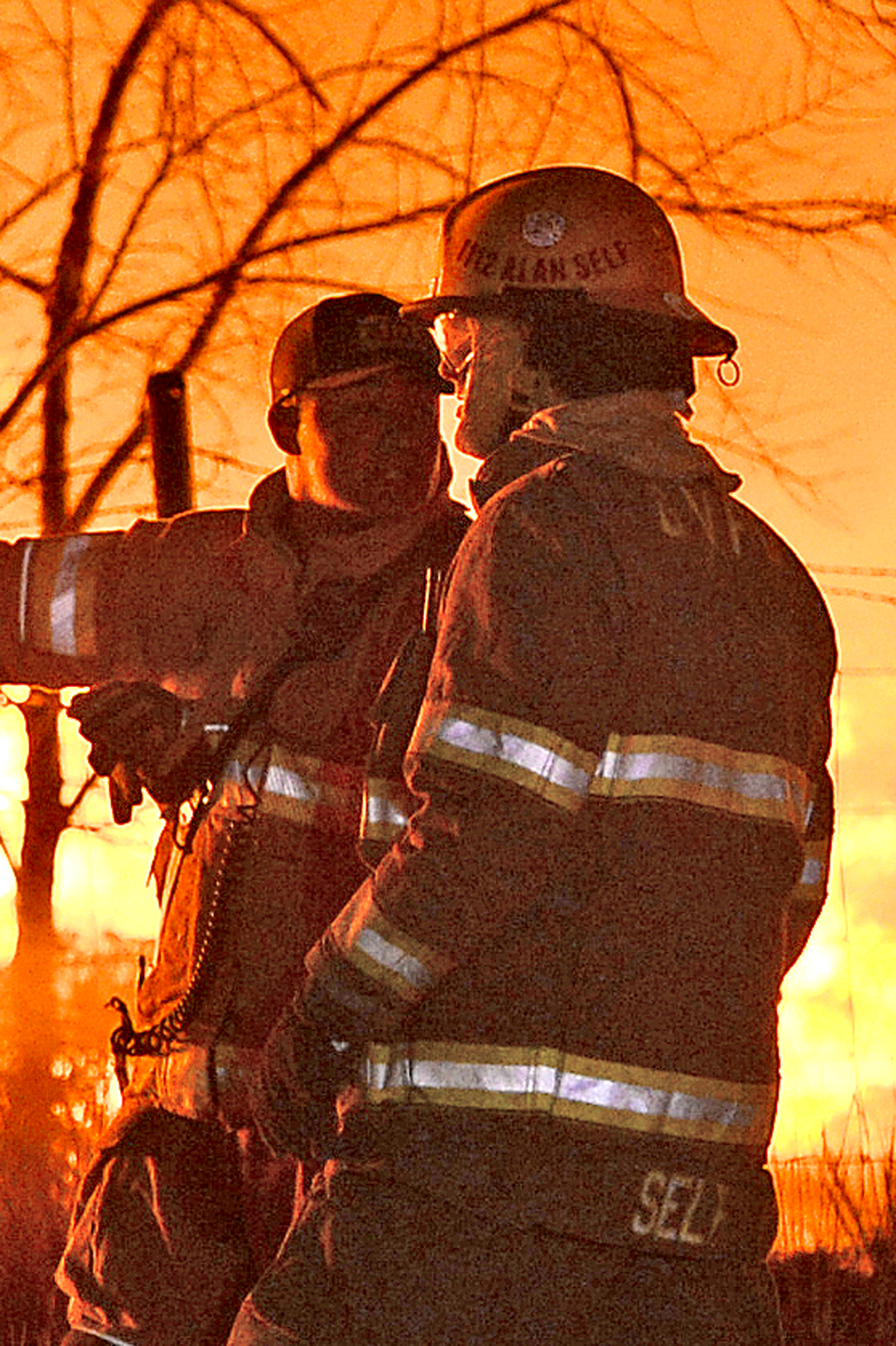 Photos Show Volunteer Firefighter Facing Arson Charges Working On Fire 