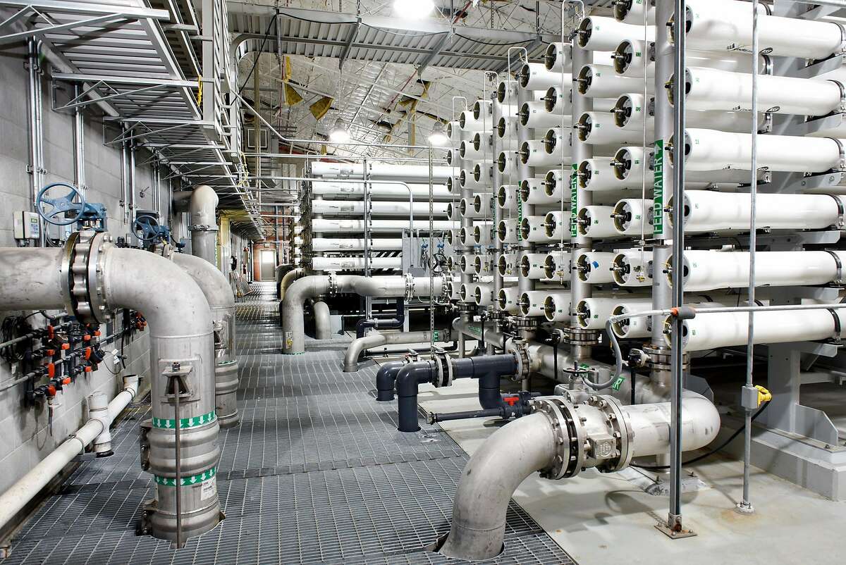 Reverse osmosis pressure vessel tubes use semi-permeable membranes to filter salt from water being processed at the Alameda County Water District's Newark Desalination Facility in Newark.