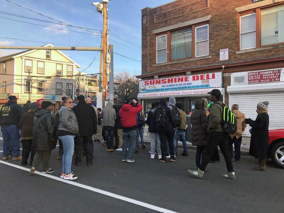 Amid antiviolence rally, deli agrees to close earlier Connecticut Post