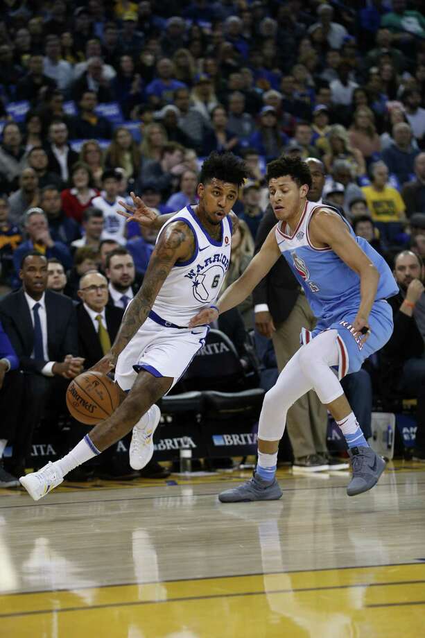 golden state warriors guard nick young (6) dribbles past