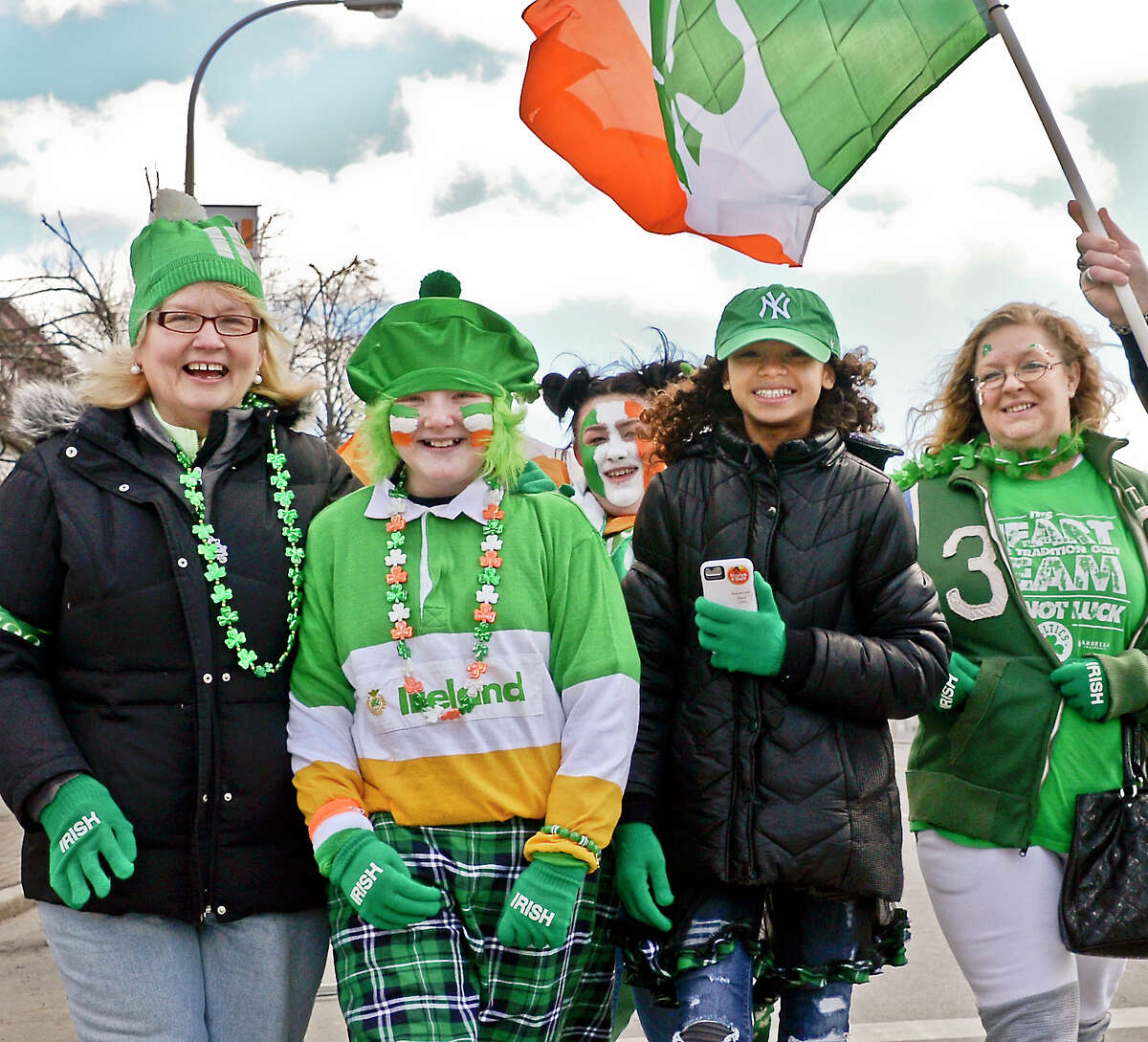 Dressed for the occasion, from left, Joellen Reynolds, Jersey Reynolds, 11, Destiny Reynolds, 18, Shellie Bryant, 11, and Christine Hart, all of Clifton Park, arrive for the 68th Annual Albany St. Patrick's Day Parade Saturday March 17, 2018 in Albany, NY. (John Carl D'Annibale/Times Union)