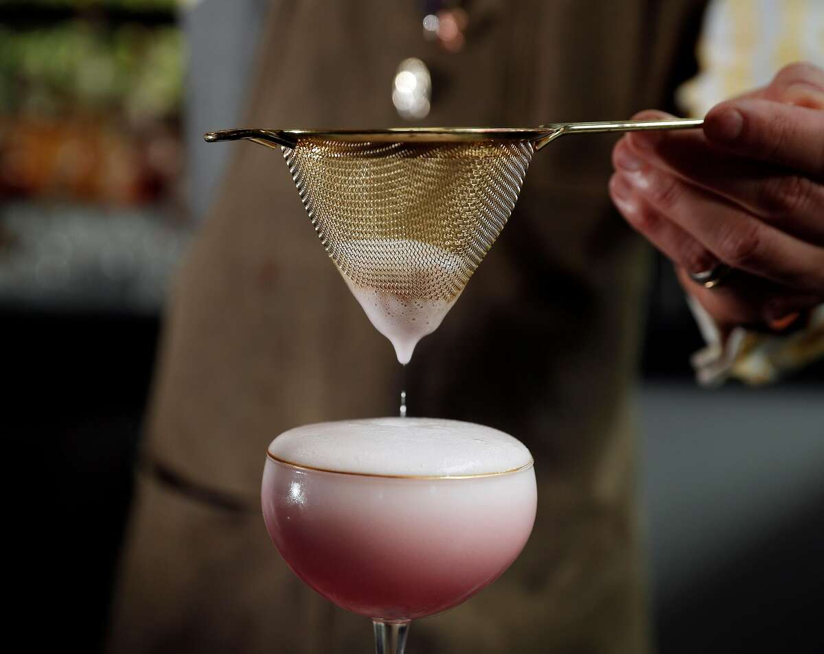 The Sakura cocktail served by bartender Ari Terrell at the Kabuki Hotel bar in San Francisco, Calif., on Thursday, March 15, 2018. The hotel lobby and bar were recently renovated with more seating areas added.