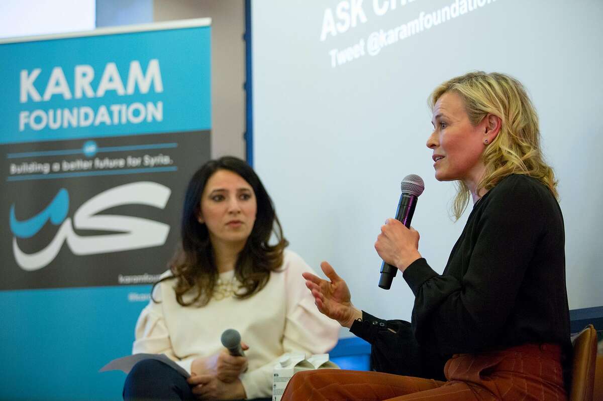 From left, Lina Sergie Attar, CEO of the Chicago-area Karam Foundation and Chelsea Handler talk about the Syrian refugee crisis at the We Work offices in San Francisco to raise money for the Syrian refugee crisis Friday evening March 16, 2018.