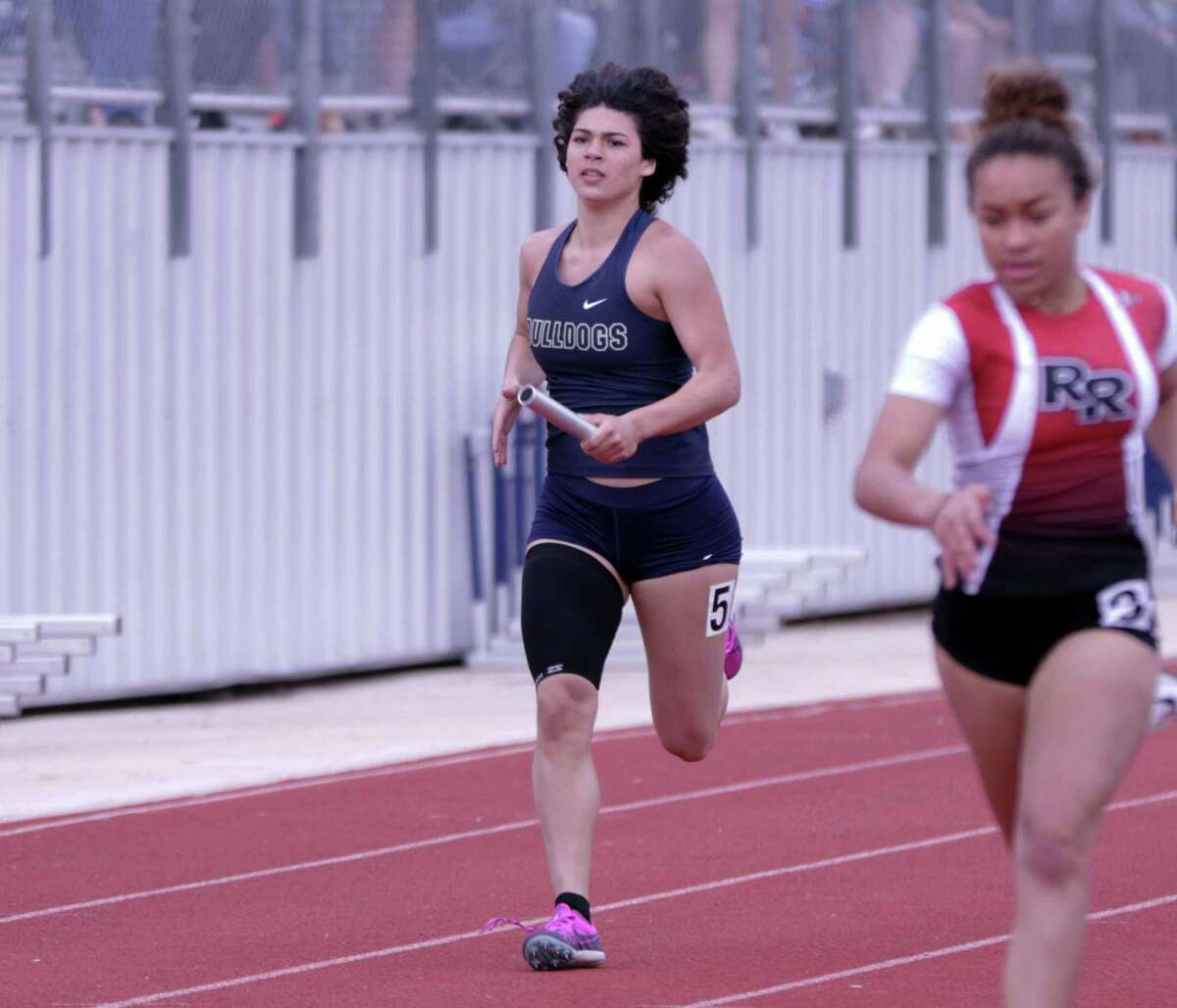 Aly Benavides and the Alexander girls' track team took first in the 4x100-meter relay.