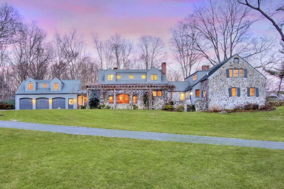 The Frazier Forman Peters’ stone house at 21 Broad Street in lower Weston has 5,065 square feet of living space and six bedrooms.